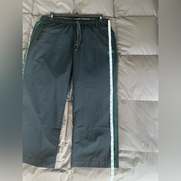 Nike Track Pants Vintage.  Black with Green Piping & Swoosh. Size-XL (16-18) - Picture 12 of 13